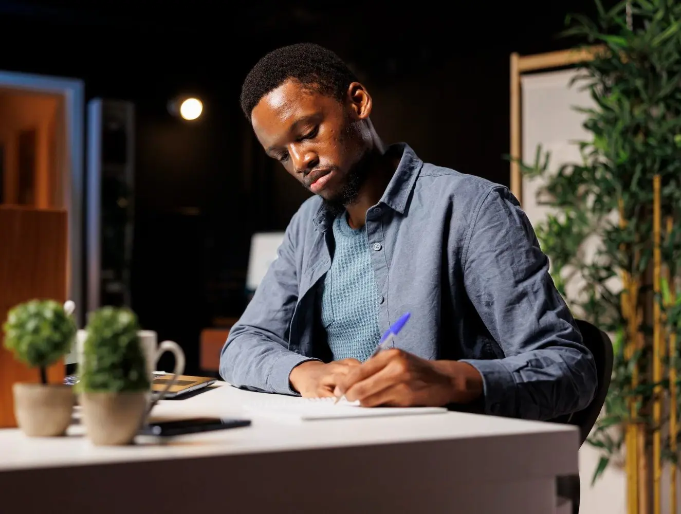 businessman learning and writing